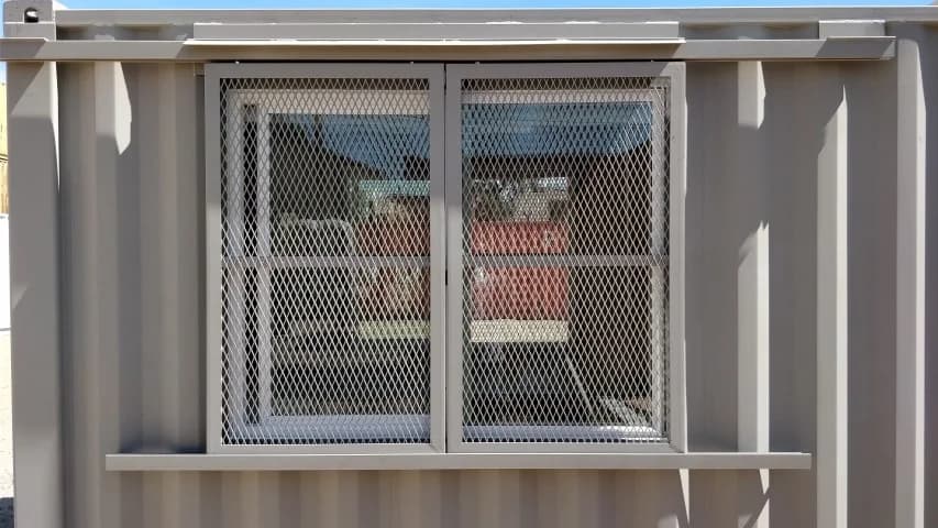 Barn door window security for storage container for sale