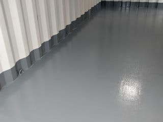 Epoxy floor for shipping container