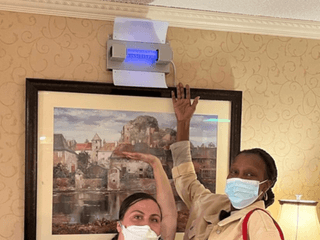 germbuster demo with masked workers