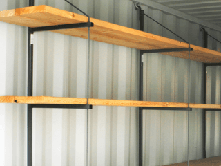Removable shelving system for shipping container