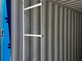Removable shelving system for shipping container
