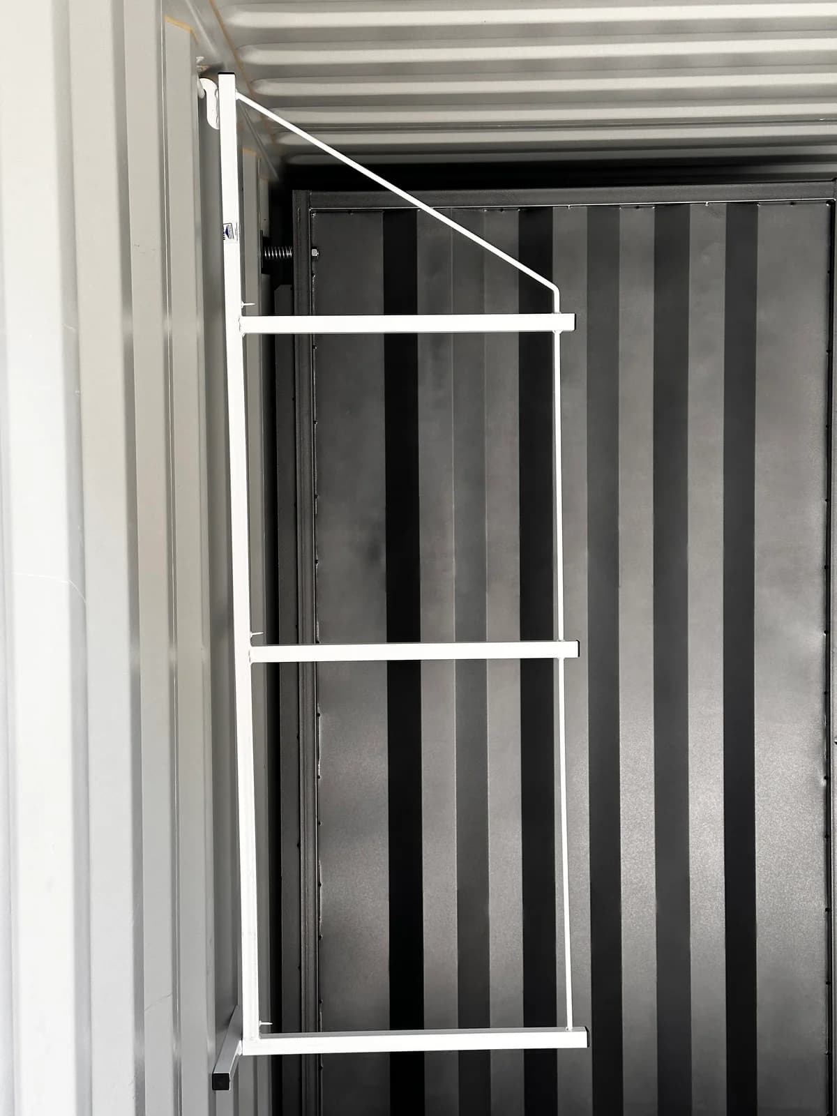 Removable shelving system for shipping container