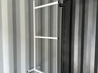 Removable shelving system for shipping container