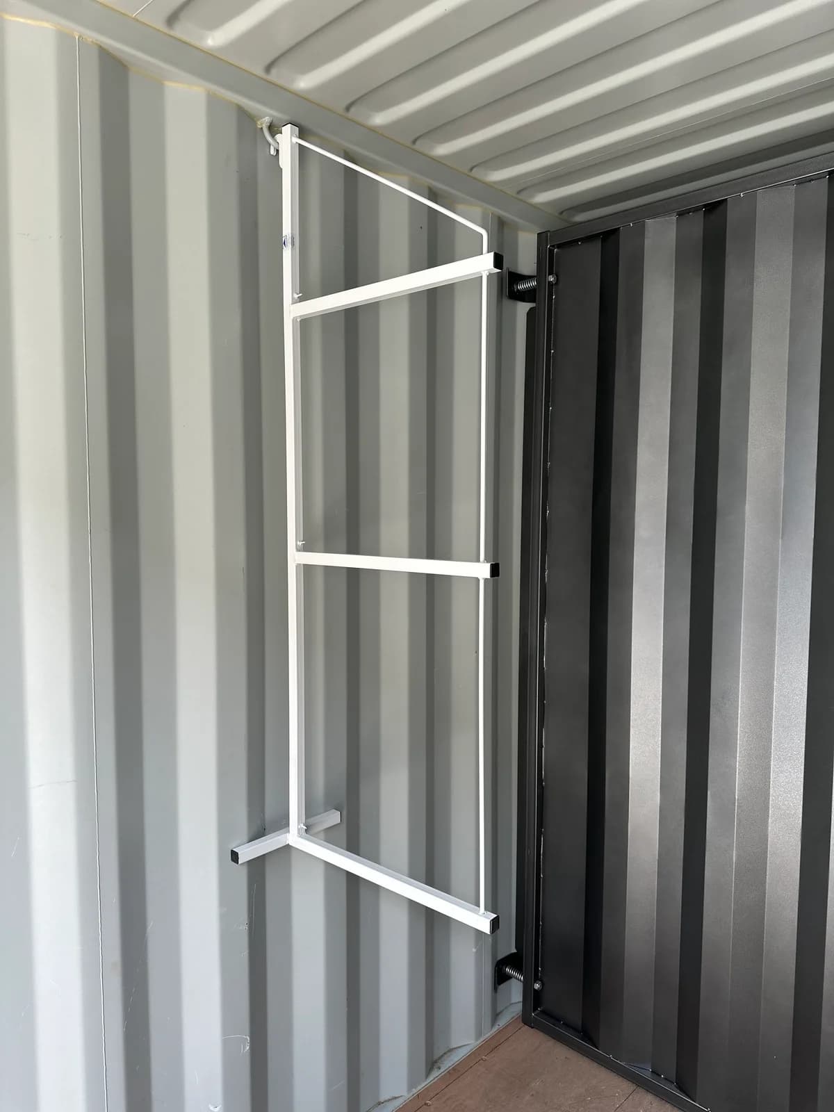 Removable shelving system for shipping container