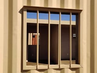 Window security bars for storage containers for sale