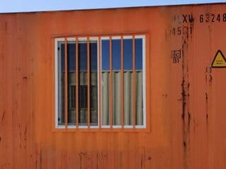 Window security bars for storage containers for sale