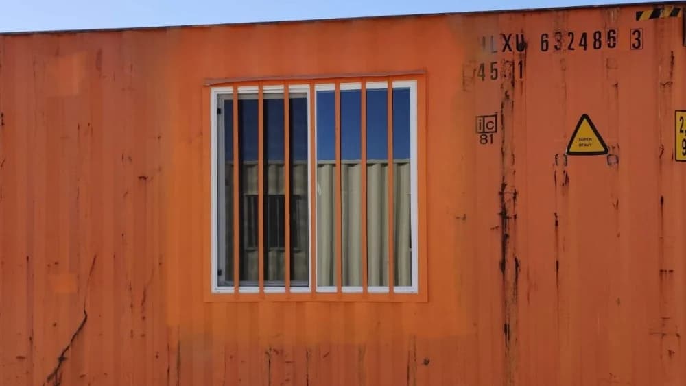 Window security bars for storage containers for sale