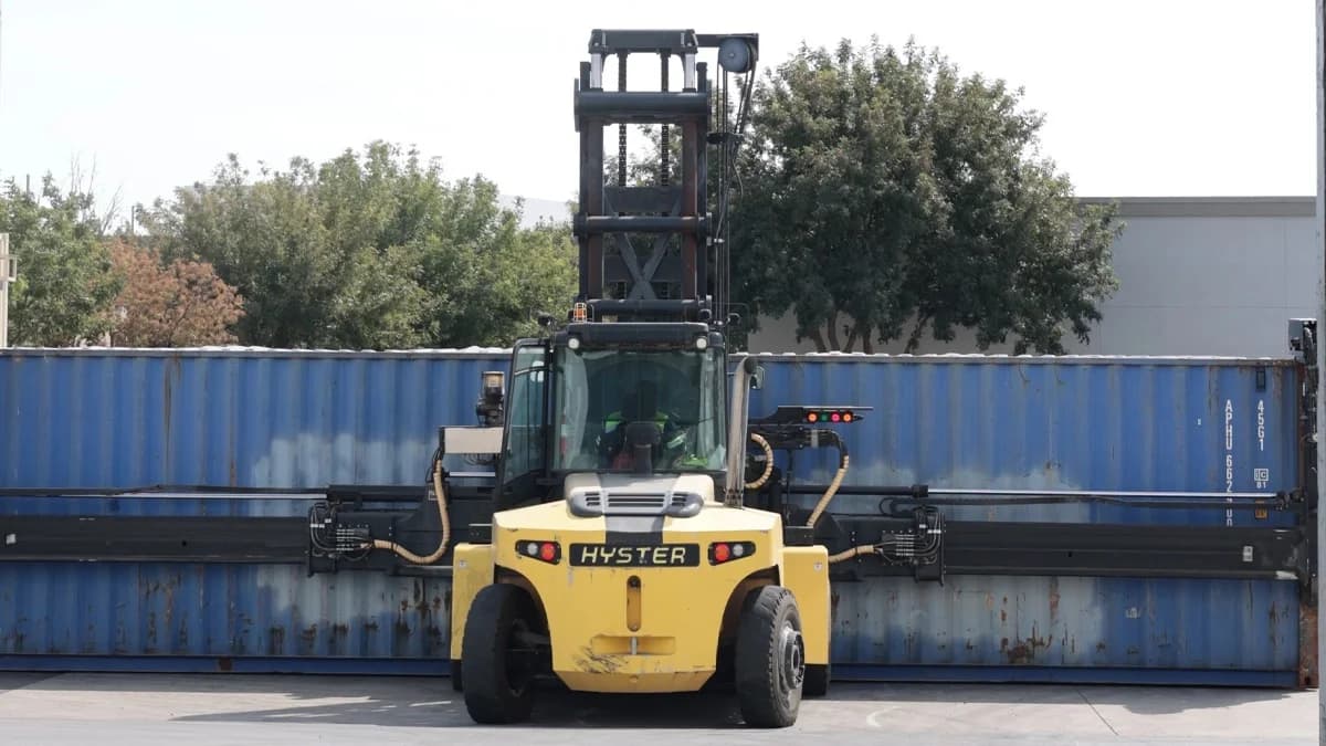 Forklift holds the container