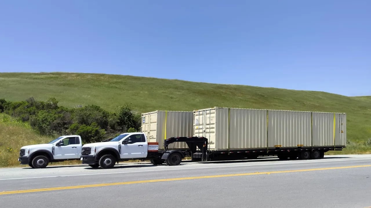 Container delivery truck
