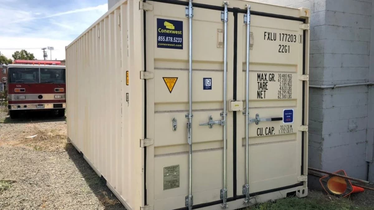 Close shot of a Conexwest container with gross, tare, and net weight markings displayed