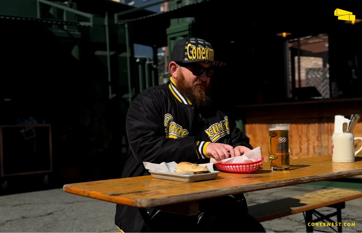 Conex Mike eating traditional German food outside the container kitchen