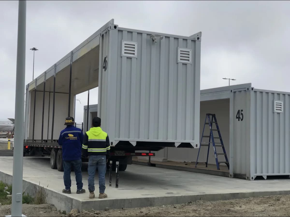Conexwest team inspecting a container delivery.