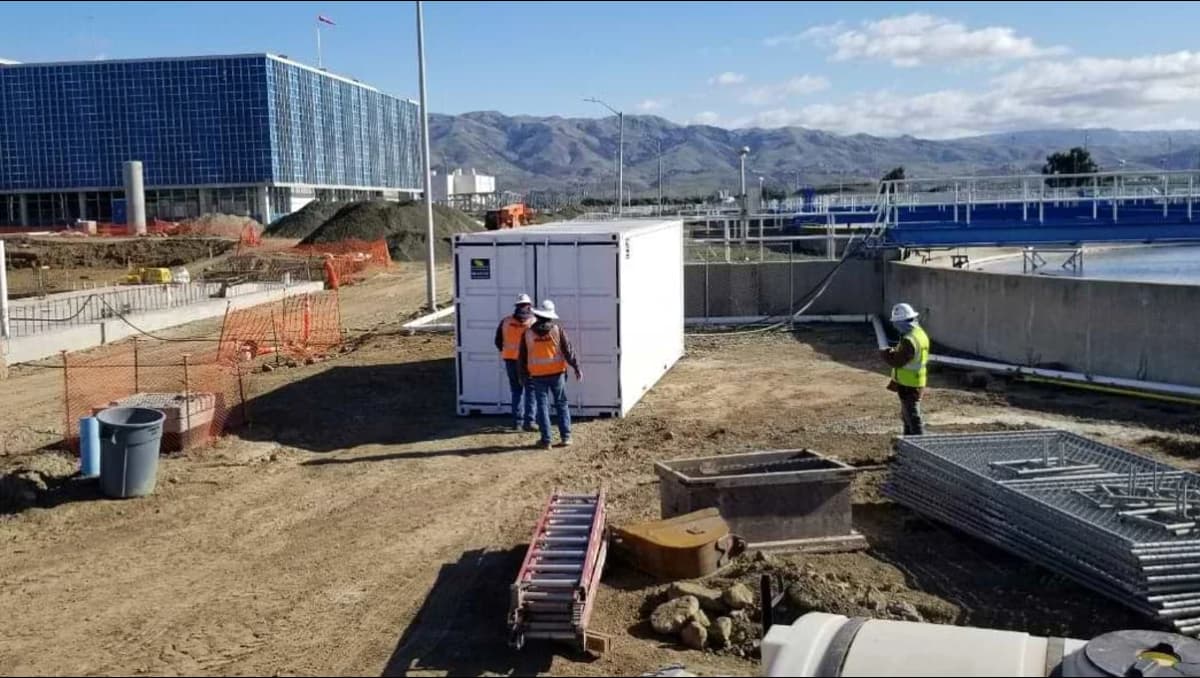 Conexwest team working on a container.