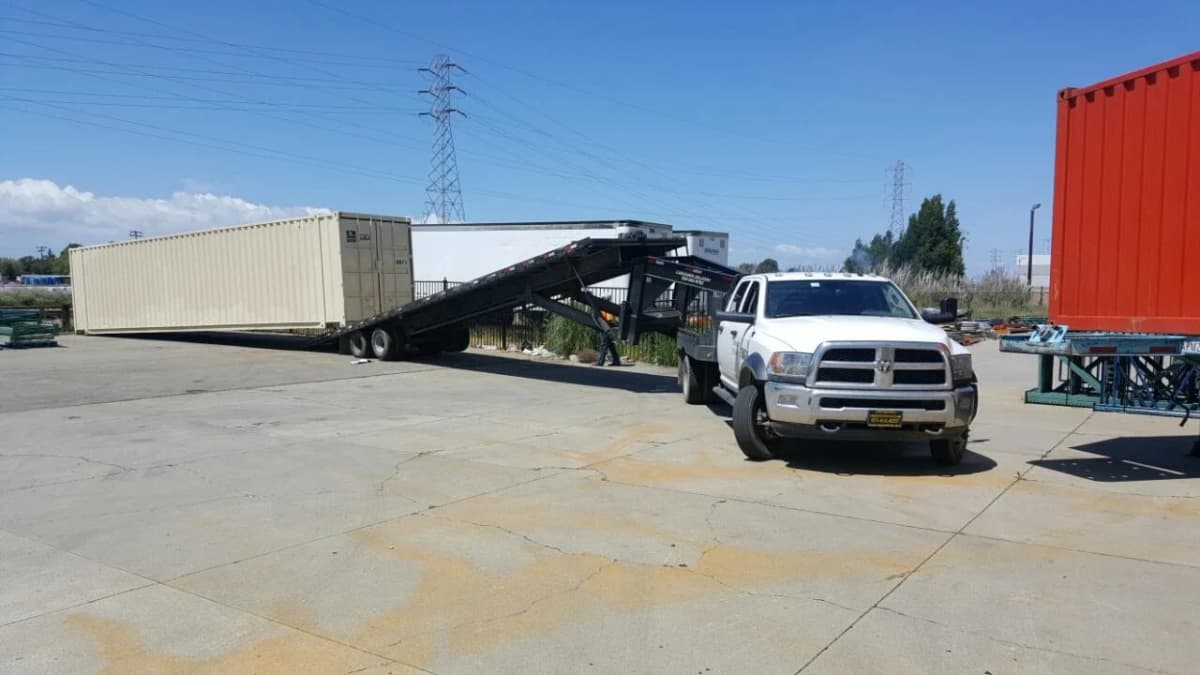 Placing shipping and storage container on the ground by Conexwest