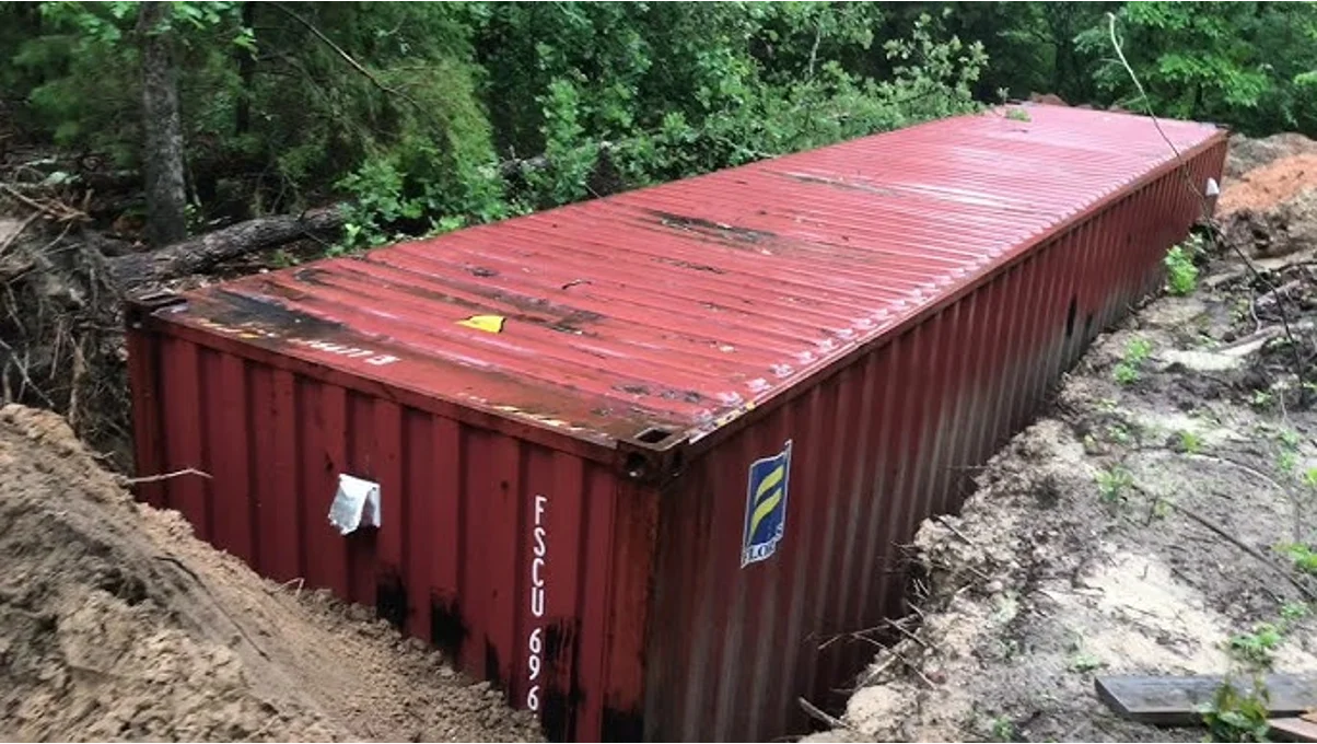 A buried container