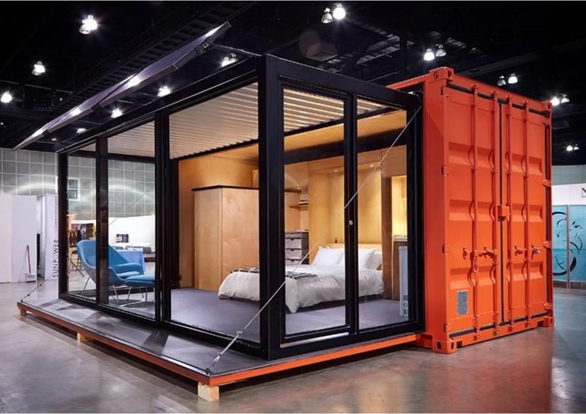 A shipping container apartment with a slide-out