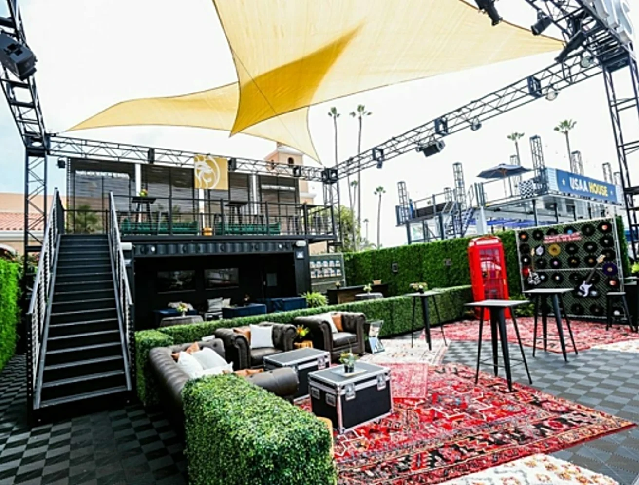 A shipping container bar with a rooftop deck