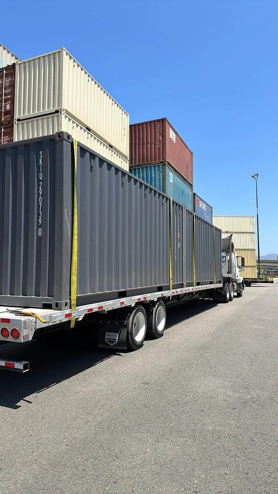 Flatbed truck container delivery
